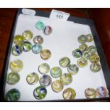 Antique latticino type glass marbles with pontils