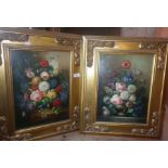 Pair of oil paintings on panel of still life with flowers