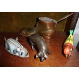 Bronze pig marked as SM or WS, inkwell (missing liner) in the form of a boot, clockwork bird and