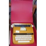 A mid-century portable typewriter by Petite International