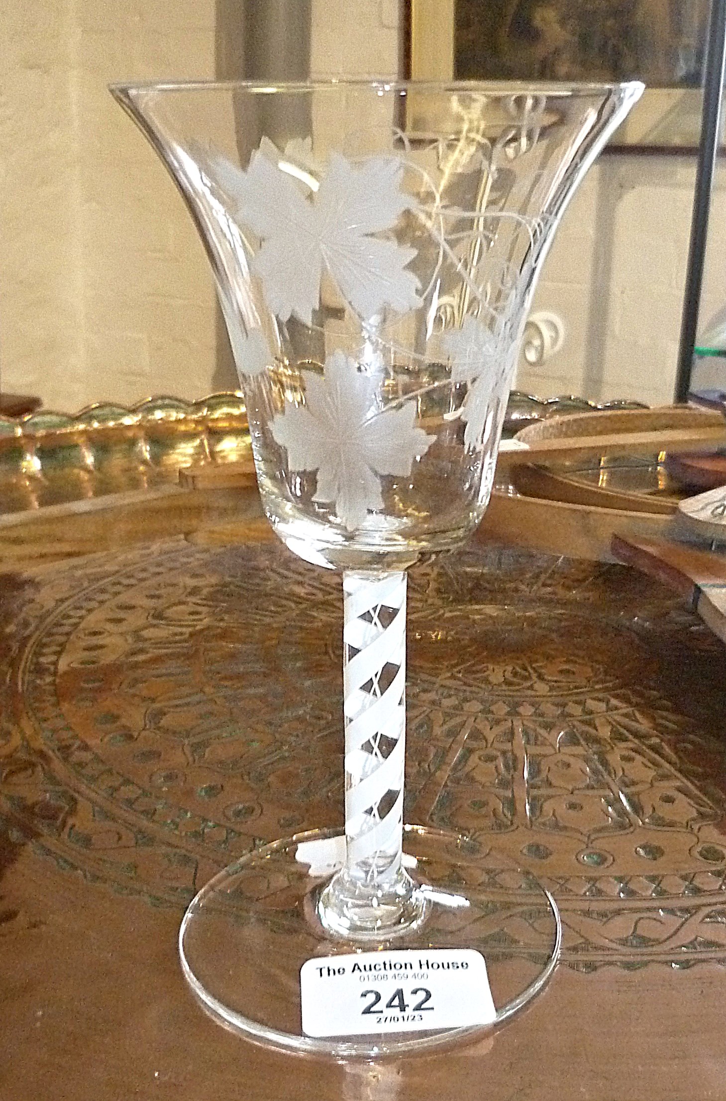 Wine glass with etched bowl and air twist stem, pontil mark, 7" tall