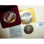 1984 commemorative 500 silver Canadian Dollar in case, 1992 USA silver Liberty dollar, and a 1967