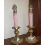 Unusual pair of Victorian brass and porcelain oil lamps in the form of candlesticks with candles