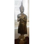 A Burmese brass statue of a standing buddha, 61cm