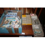 Large quantity of postcards, tea cards and cigarette cards