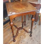 Inlaid mahogany occasional table on turned legs with shaped stretchers