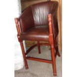 Upholstered bar stool with arms on turned wood legs