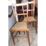 Pair of cane seated bedroom chairs