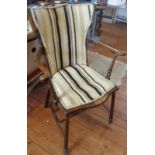 Art Nouveau stained beech elbow chair with upholstered seat and back