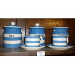 TG Green Cornishware blue banded storage jars and utensil holder, with two cups and saucers