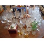 Large quantity of drinking glasses and glass vases, etc.