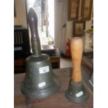 Large hand bell marked as 12 outer, and D. Wells inside. Approx. 30cm high. Together with another