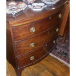 Georgian mahogany bow fronted chest of three drawers on bracket feet (with later handles)