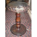 Victorian mahogany revolving piano stool with leather upholstered seat