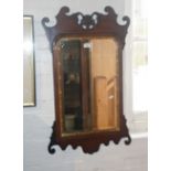 Chippendale-style wall mirror having shaped mahogany frame & bevelled glass