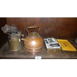 Copper kettle, Primus blow torch and a large tobacco tin containing cigarette cards