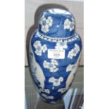 Large Chinese blue and white ovoid prunus jar and cover