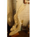 Tall painted metal sculpture of two fishes on wood plinth, 42" high