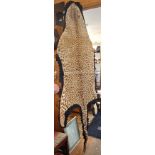 Cheetah skin floor rug