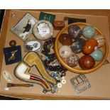 Assorted items, inc. marble eggs, a pipe in a case, etc.