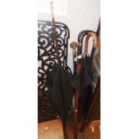 Carved walking stick, Victorian parasol and a fretwork music rack