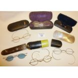 Antique spectacles and cases, one with blue lenses. Together with a hallmarked silver glasses case