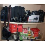 Pentax MZ-7 camera, a Canon EOS 400D camera, Olympus OM30, lenses and assorted accessories (two