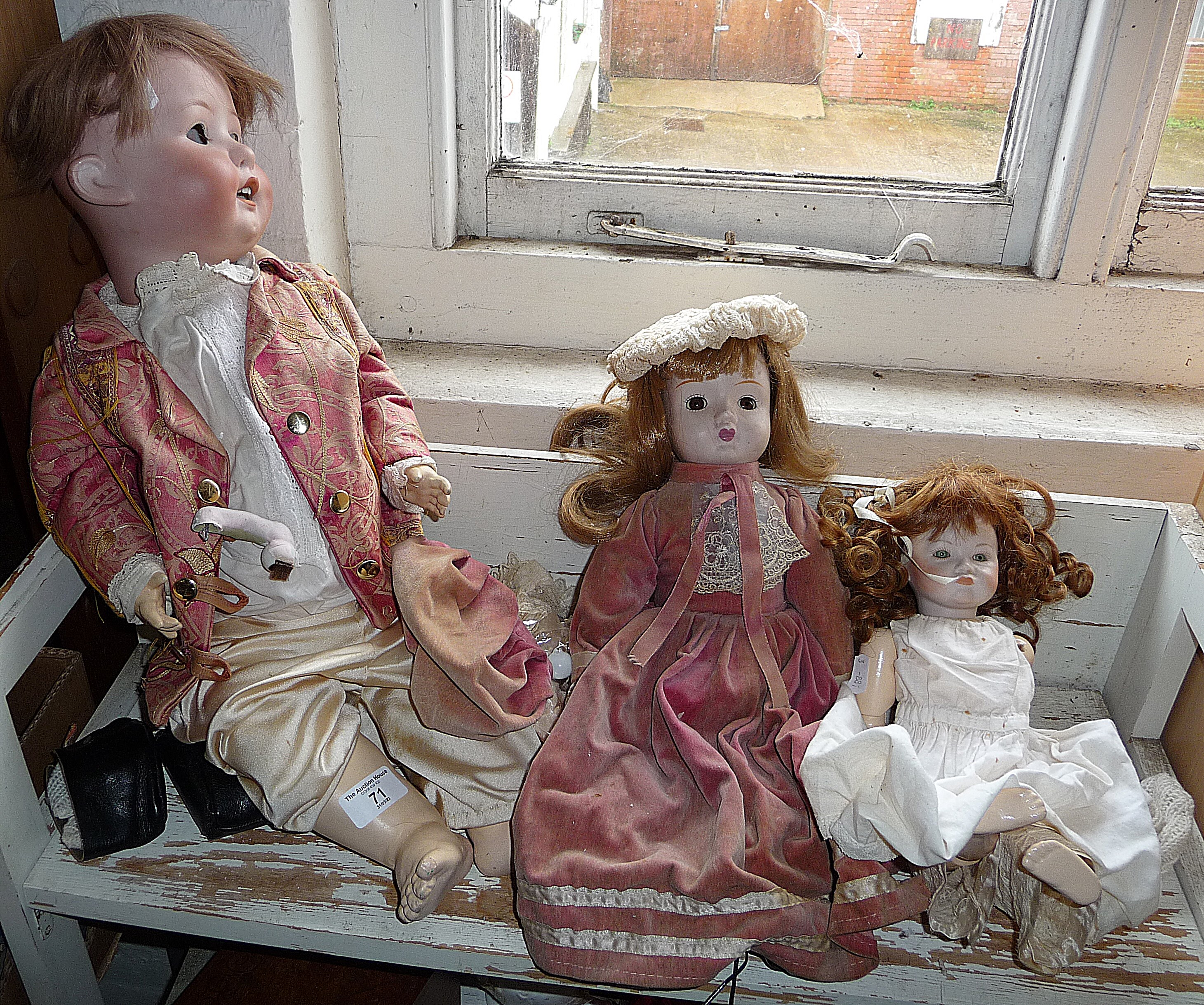 Three bisque headed dolls