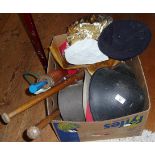 Assorted hats, inc. steel helmet and two Indian clubs