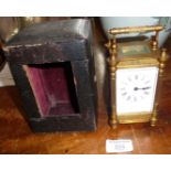 19th c. gilt brass carriage clock having four column body (crack to glass) with leather case and