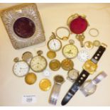 Assorted old pocket and wrist watches, parts, and two pocket watch stands - one hallmarked silver