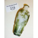 Chinese export snuff bottle in overlay cameo glass, carved with figural scenes (some fine cracks)