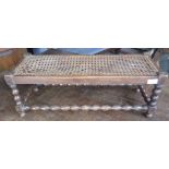 Footstool on bobbin turned legs and stretcher, cane seat A/F