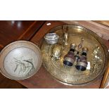 Brass lady bell, lizard, tortoise box, binoculars, studio pottery bowl on chased brass tray