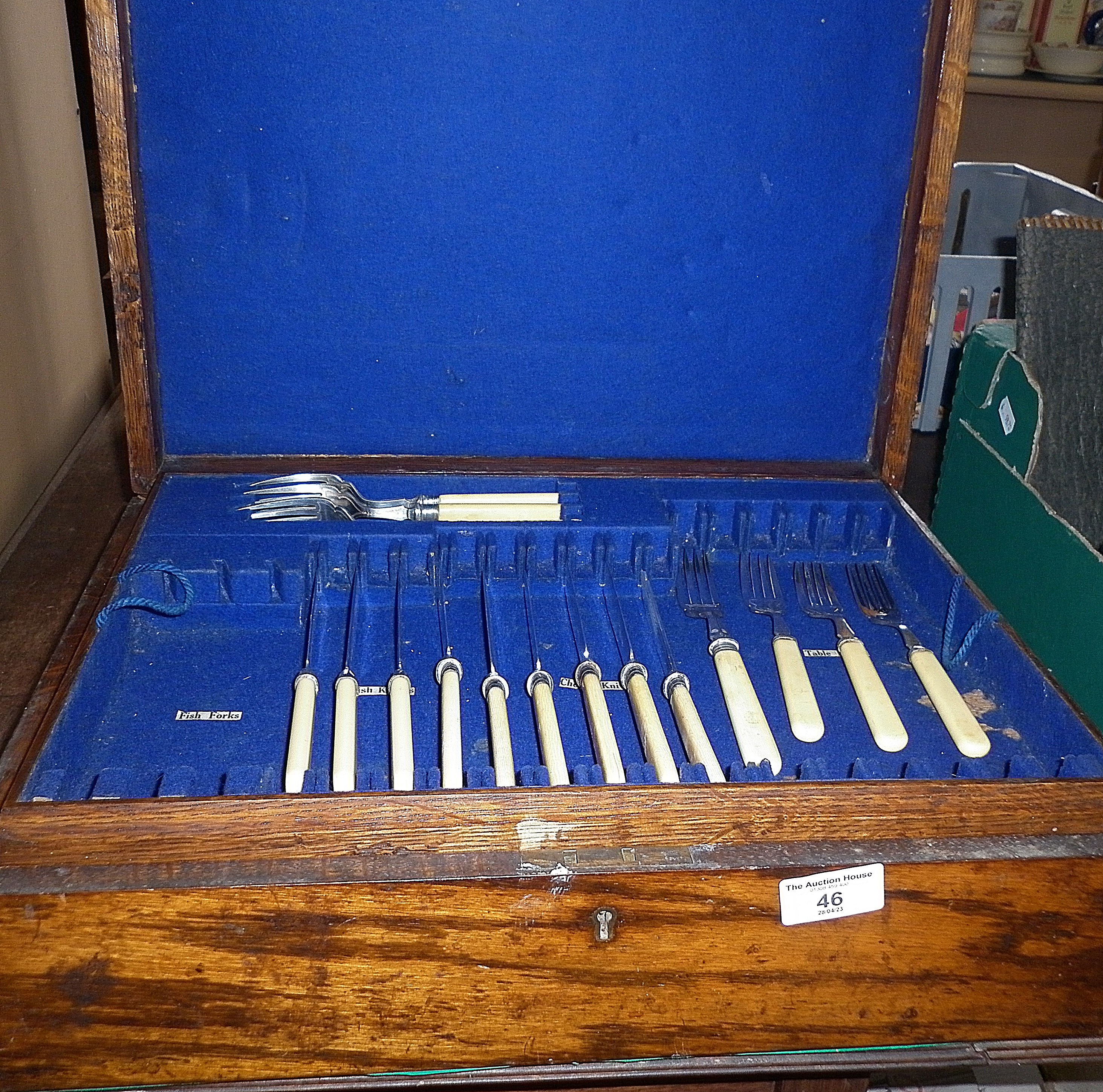 Edwardian two-tier oak canteen of cutlery