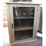 Stripped pine single door cabinet