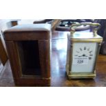 Victorian brass carriage clock, French movement, working order with key and leather case, 9" x 3"