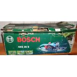 A Bosch electric chain saw, as new