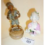 Spelter boot polisher boy figure on marble base, and a pincushion doll lady