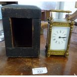 19th c. gilt brass carriage clock having four column body (crack to glass) with leather case and