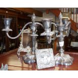 Pair of silver plated candlesticks and two photo frames, one antique and silver fronted