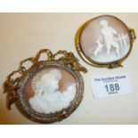 Two large antique carved shell cameo brooches, one with rare subject matter of boy with dog (approx