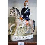 Staffordshire figure of a man on a horse inscribed, G. Havelock