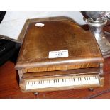 Wooden musical cigarette box in the form of a grand piano