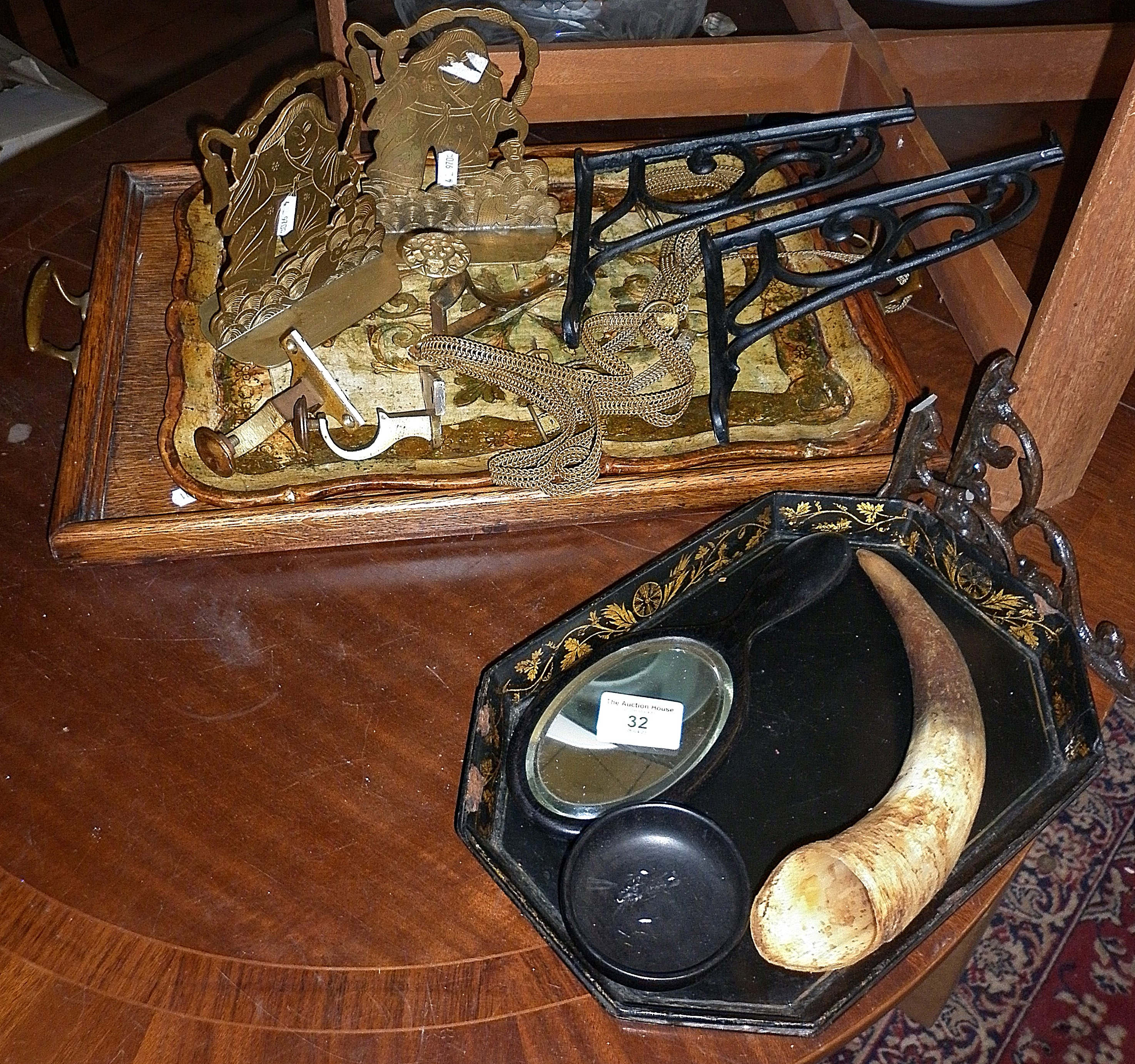 Chinese brass bookends, three pairs of brackets, papier mache tray and two other trays etc.