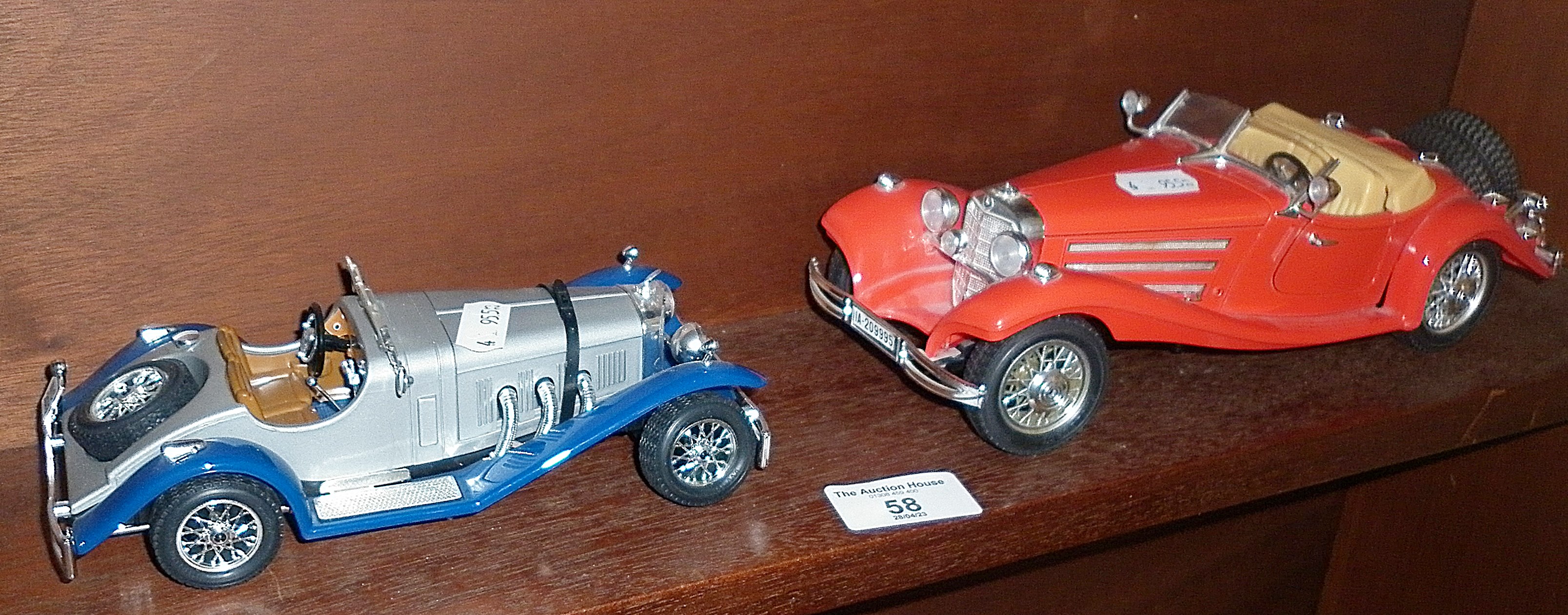 A Durango diecast model of a Mercedes 500k roadster and a Mercedes SSK