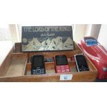 Five various mobile telephones and a boxed set of J.R.R. Tolkien Lord of the Rings vintage audio