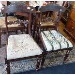 Pair of mid 19th c. mahogany dining chairs with carved top rail and bar having tapestry seats