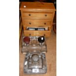 Silver topped inkwell, another and a mini chest of drawers containing fossils