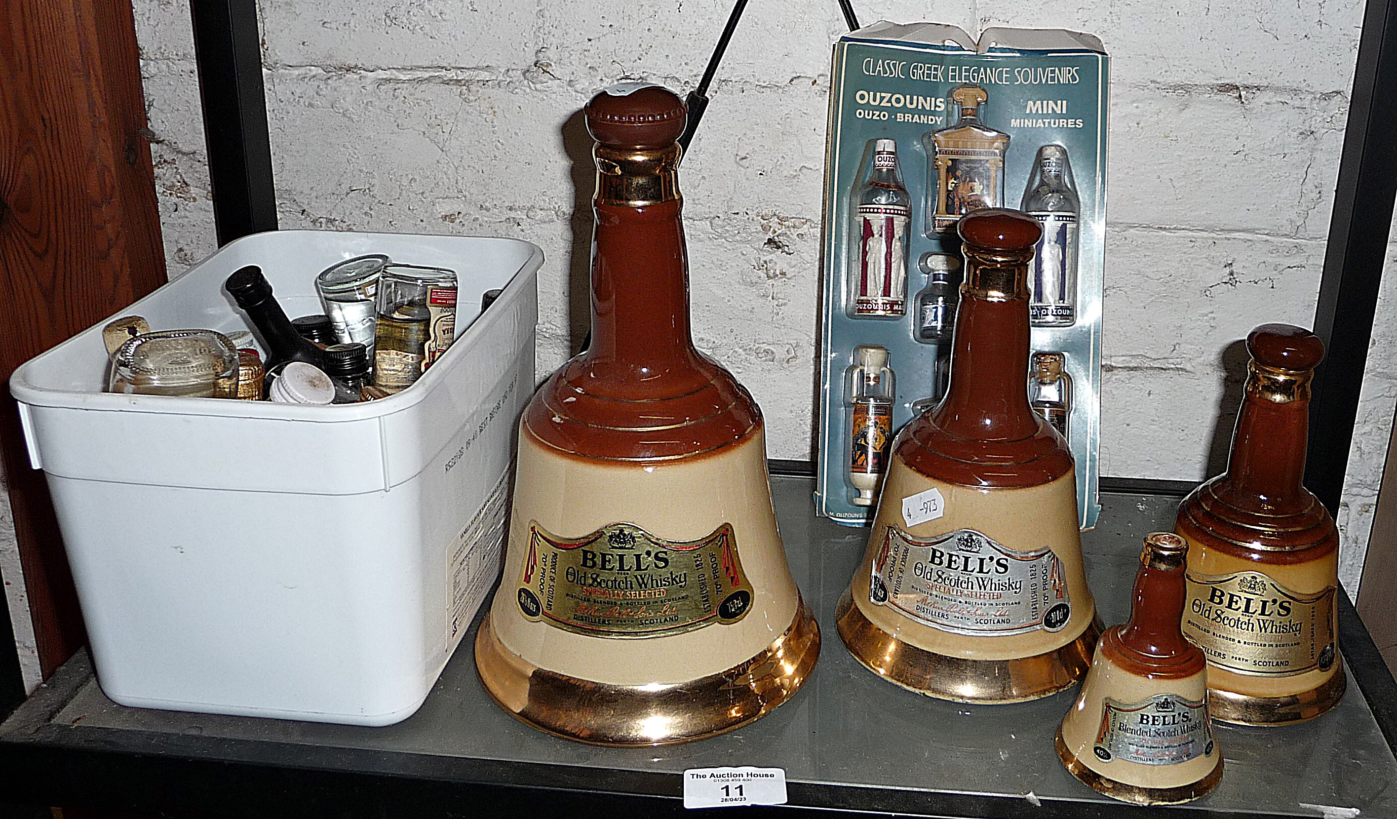 Graduated set of Wade Bells Whisky decanters and collection of miniature spirits